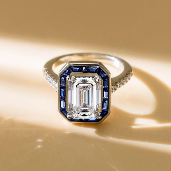 Emerald Cut Bezel Engagement Ring in Rhodium-Plated Sterling Silver