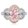 Two-Tone Oval Cut Three Stone Engagement Ring in Sterling Silver