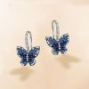 Dancing Butterfly Blue Sapphire Drop Earrings for Women in Sterling Silver