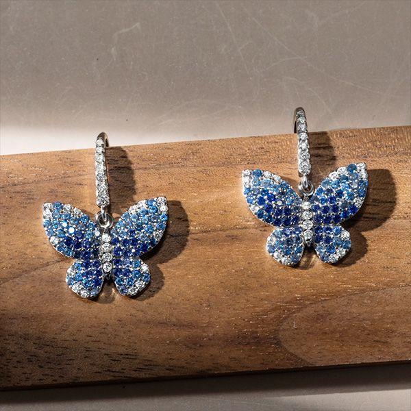 Dancing Butterfly Blue Sapphire Drop Earrings for Women in Sterling Silver