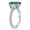 Three Stone Emerald Cut Engagement Ring in Rhodium-Plated Sterling Silver