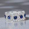 Stone Blue Sapphire Half Eternity Wedding Band in Sterling Silver