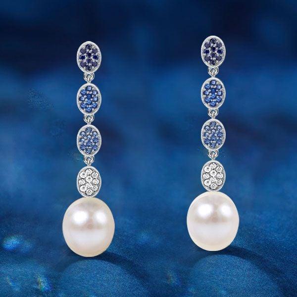 Dangle Earrings with Blue Topaz and Pearl Drops in Rhodium Plated Sterling Silver