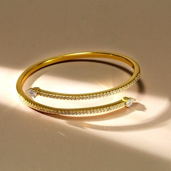 Rhodium Plated Sterling Silver Bangle Bracelet with Golden Pear & White Sapphire