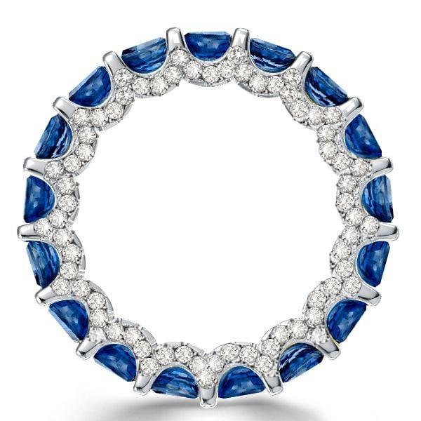 Emerald Cut Blue Topaz Eternity Band Ring in Rhodium-Plated Sterling Silver