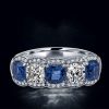 Alternating Blue and White Sapphire Halo Cushion Cut Wedding Band in Sterling Silver