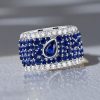 Micro-Pave Emerald & Pear Cut Blue Sapphire Eternity Band in Sterling Silver