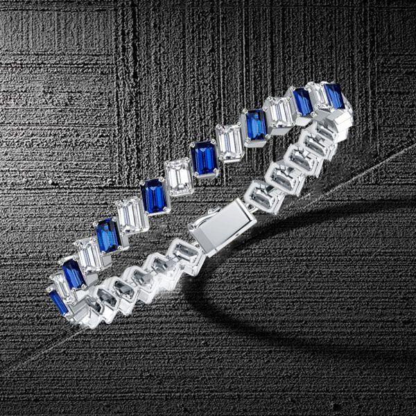 Emerald Cut White & Blue Stone Tennis Bracelet - Sterling Silver