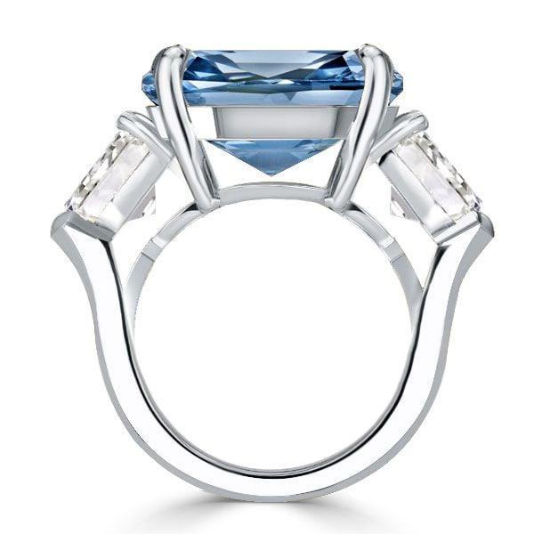 Three Stone Emerald Cut Blue Topaz Engagement Ring in Rhodium Plated Sterling Silver