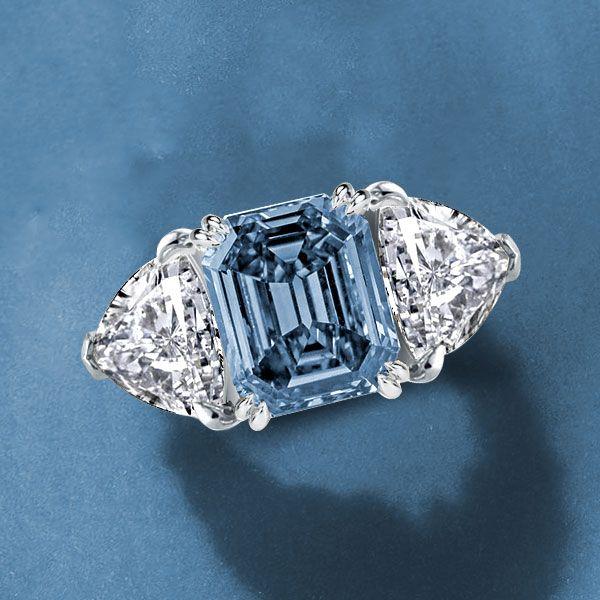 Emerald Blue Topaz Three Stone Engagement Ring - Sterling Silver