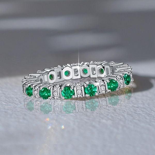 Round Cut Emerald and Sapphire Eternity Band Ring in Rhodium-Plated Sterling Silver