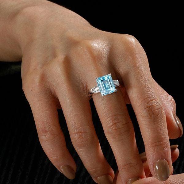 Three Stone Emerald Cut Aquamarine Engagement Ring in Rhodium-Plated Sterling Silver