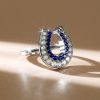 Sterling Silver White and Blue Sapphire Horseshoe Ring for Women | 0.85 CTW