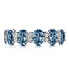 Oval Blue Topaz Eternity Wedding Band in Sterling Silver