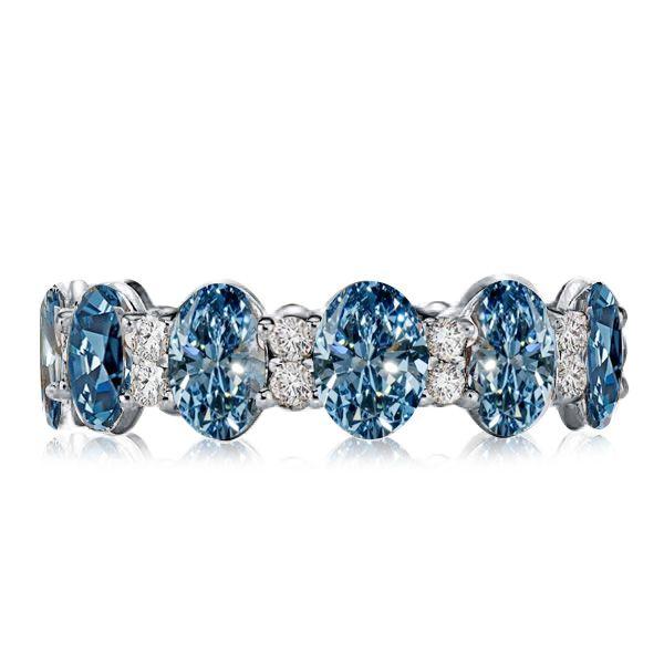 Oval Blue Topaz Eternity Wedding Band in Sterling Silver