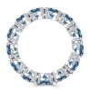 Oval Blue Topaz Eternity Wedding Band in Sterling Silver