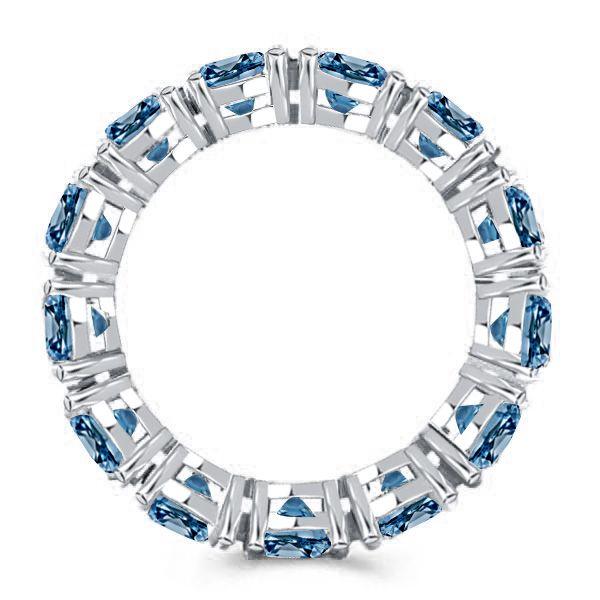 Oval Blue Topaz Eternity Wedding Band in Sterling Silver
