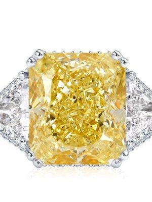 Three Stone Radiant Cut Yellow Topaz Engagement Ring in Rhodium Plated Sterling Silver