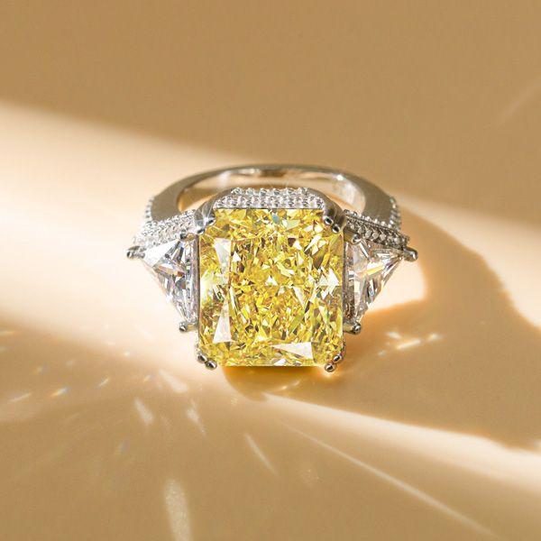 Three Stone Radiant Cut Yellow Topaz Engagement Ring in Rhodium Plated Sterling Silver