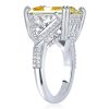Three Stone Radiant Cut Yellow Topaz Engagement Ring in Rhodium Plated Sterling Silver