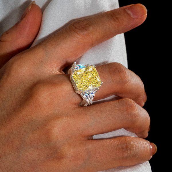 Three Stone Radiant Cut Yellow Topaz Engagement Ring in Rhodium Plated Sterling Silver