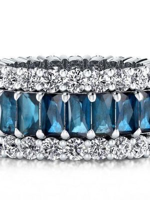 Emerald Cut Created Blue Topaz Eternity Wedding Band in Sterling Silver