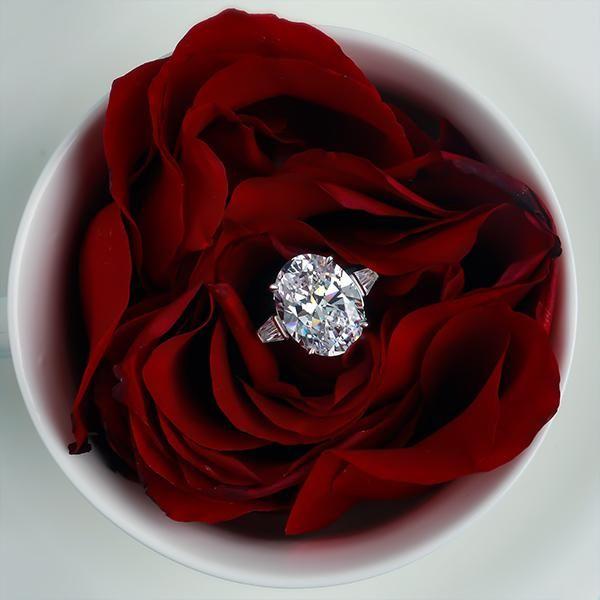 Oval Three Stone White Sapphire Engagement Ring - Sterling Silver