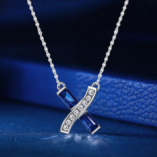 Blue Sapphire Baguette Infinity Cross Necklace - Sterling Silver