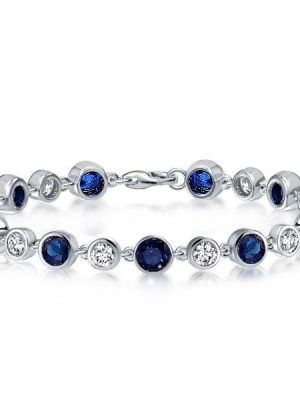 Alternating White and Blue Sapphire Tennis Bracelet in 925 Sterling Silver