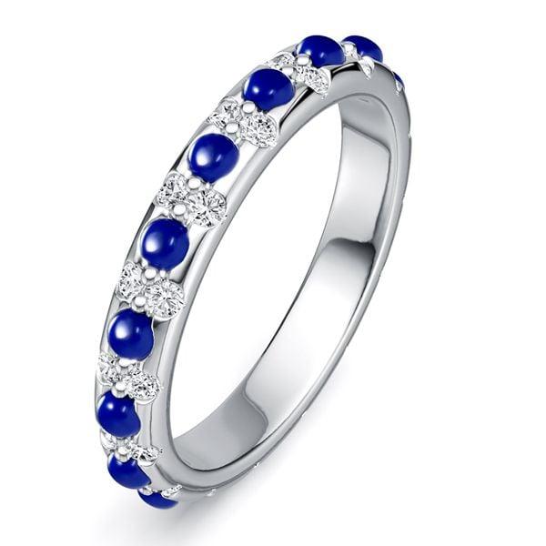 Round Cut White and Blue Sapphire Eternity Band Ring in Rhodium Plated Sterling Silver