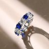Cushion Cut White and Blue Sapphire Eternity Band Ring in Sterling Silver