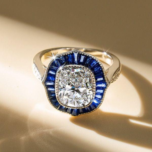 Art Deco Cushion Cut Blue Sapphire Halo Engagement Ring in Rhodium Plated Sterling Silver