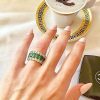 Two Tone Emerald Cut Cubic Zirconia Triple Row Wedding Band in Sterling Silver