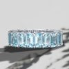 8.50 CT. TW. Emerald Cut Aquamarine Eternity Band Ring in Rhodium Plated Sterling Silver