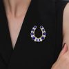 Vintage Horseshoe Brooch with Golden White & Blue Sapphires in 925 Sterling Silver Plated