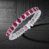 Alternating Ruby and White Cubic Zirconia Tennis Bracelet in Rhodium-Plated Sterling Silver