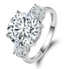 Three Stone Created White Sapphire Engagement Ring in Sterling Silver