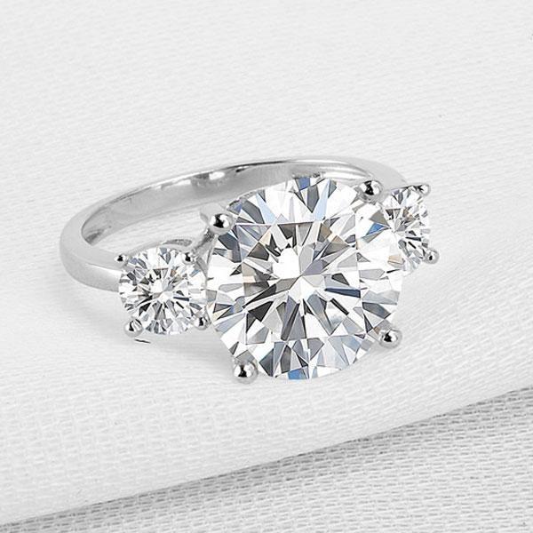 Three Stone Created White Sapphire Engagement Ring in Sterling Silver