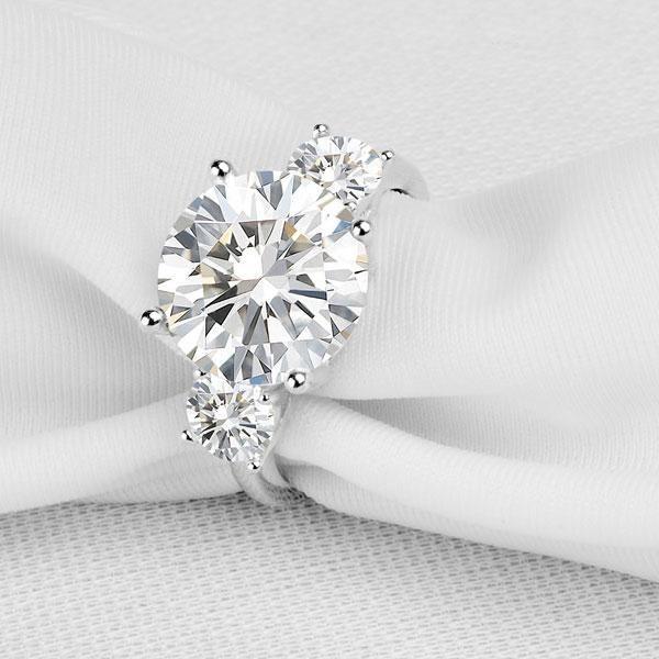 Three Stone Created White Sapphire Engagement Ring in Sterling Silver