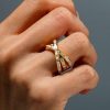 2.40 CT. TW. White Baguette Criss Cross Wedding Band for Women in Rhodium-Plated Sterling Silver