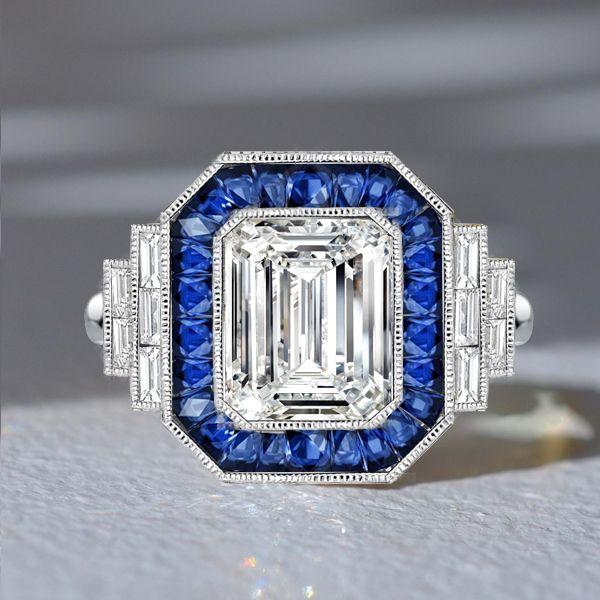 Emerald Cut Blue Sapphire Halo Engagement Ring in Sterling Silver