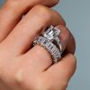 Emerald Cut Three Stone Bridal Set in Sterling Silver with Rhodium Finish