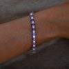 Oval Cut Amethyst Tennis Bracelet in Rhodium Plated 925 Sterling Silver