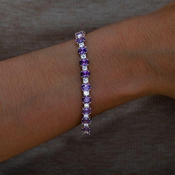 Oval Cut Amethyst Tennis Bracelet in Rhodium Plated 925 Sterling Silver