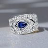 Pear Cut Blue Sapphire Wedding Band in 925 Sterling Silver with Rhodium Plating