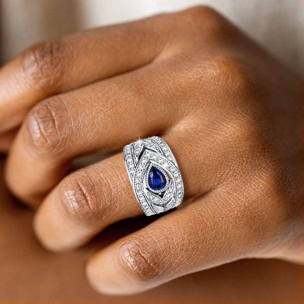 Pear Cut Blue Sapphire Wedding Band in 925 Sterling Silver with Rhodium Plating