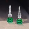 Emerald Cut Emerald and Sapphire Drop Earrings in Rhodium Plated 925 Sterling Silver