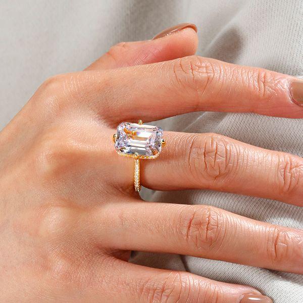Emerald Cut Golden Hidden Halo Engagement Ring in 18K Gold Plated Sterling Silver
