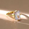 Emerald Cut Golden Hidden Halo Engagement Ring in 18K Gold Plated Sterling Silver