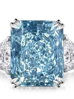 Three Stone Radiant Cut Blue Topaz Engagement Ring in Sterling Silver with Rhodium Plating